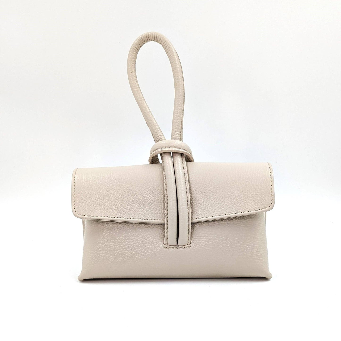 Chic leather clutch bag with pull through loop strap